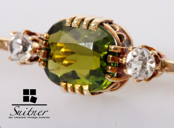 Art Deco Brosche mit Peridot und Diamanten 585 Gold Stab