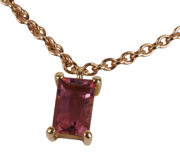 zeitloses Armband mit pinken Saphir aus 585 Gold - Baguette Schliff